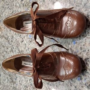 New AE Brown Ankle Booties size 6. Man-made material. Great used condition